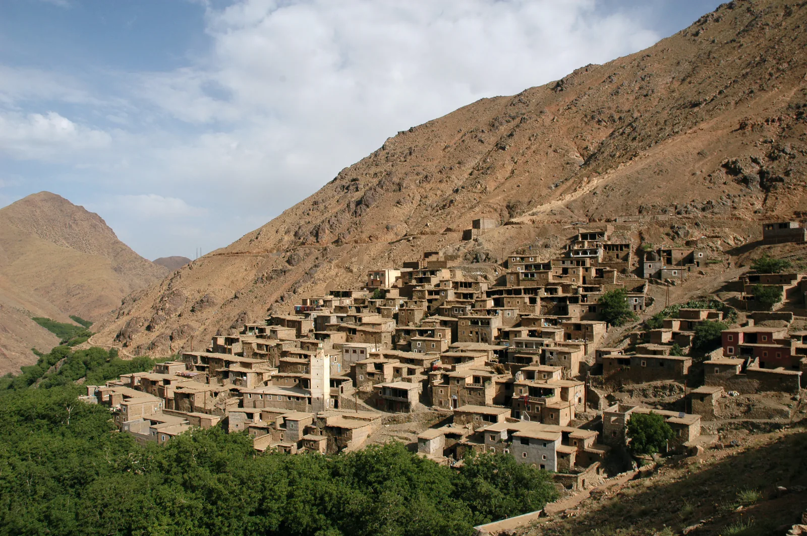 Stone houses of a Berber village on a dry mountainside