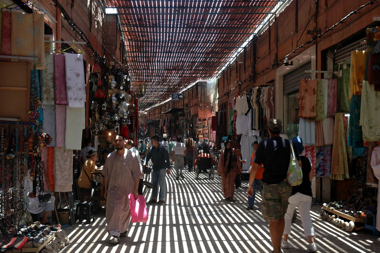 Shoppers walking through the covered Semmarine souk in Marrakech